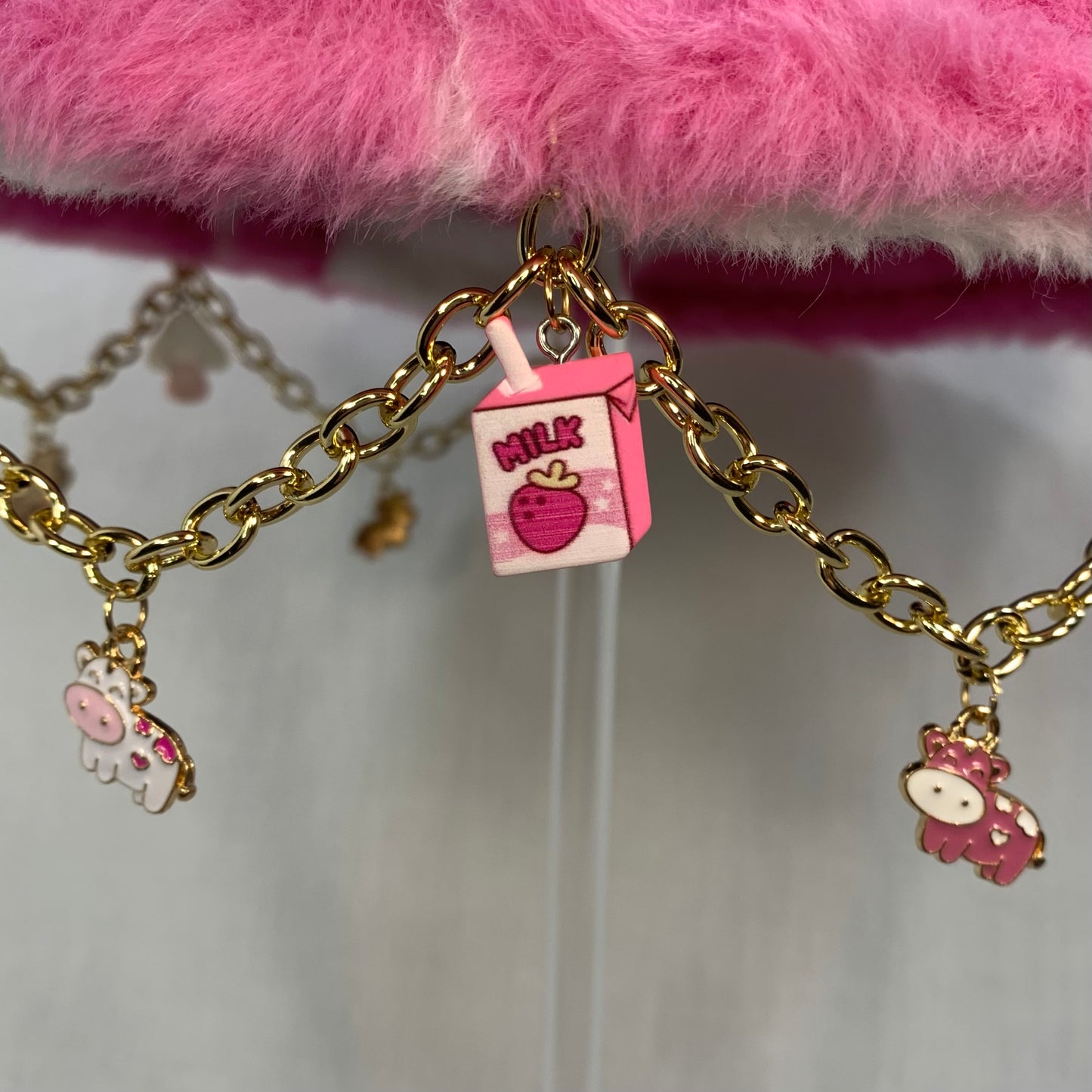 Strawberry Milk Vibes! Pink Cow Charms and Chain Faux Fur Bucket Hat