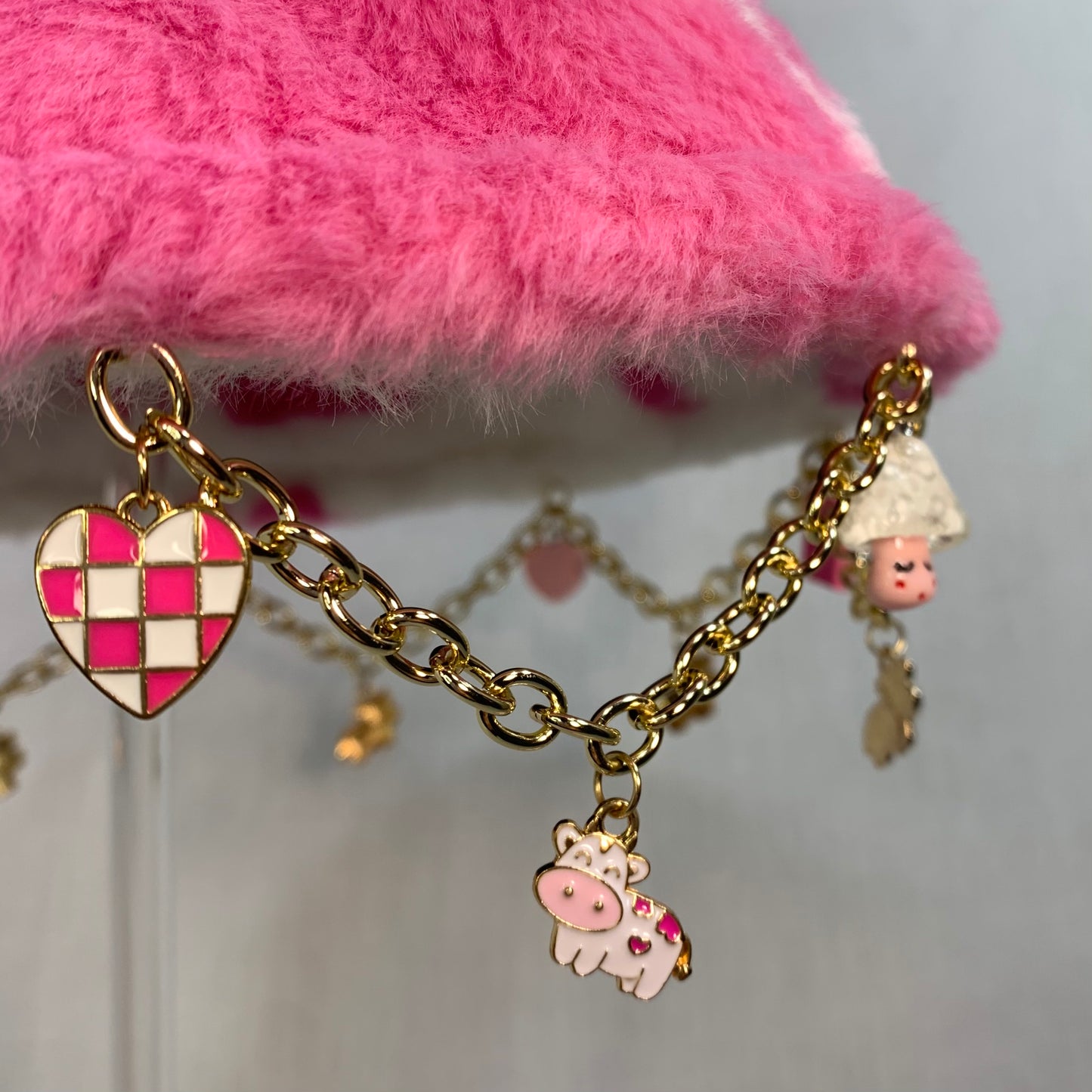 Strawberry Milk Vibes! Pink Cow Charms and Chain Faux Fur Bucket Hat